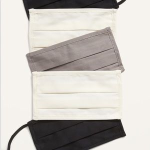 Five pack face KIDS masks from OLD NAVY, triple layers. Assorted colors.